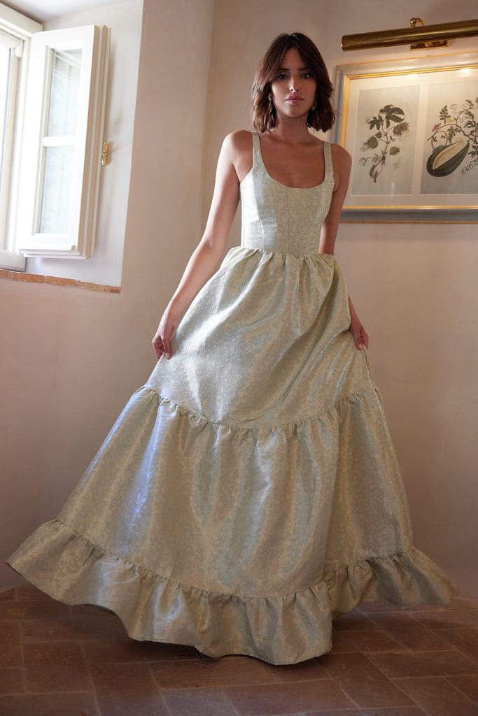 photo of model from the front in the avery dress in sage duchess