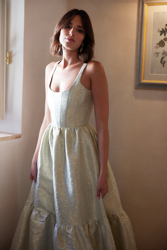 3/4 photo of model from the from the avery dress in sage duchess