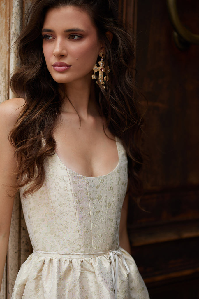 close up photo of model  in the avery dress in taupe duchess