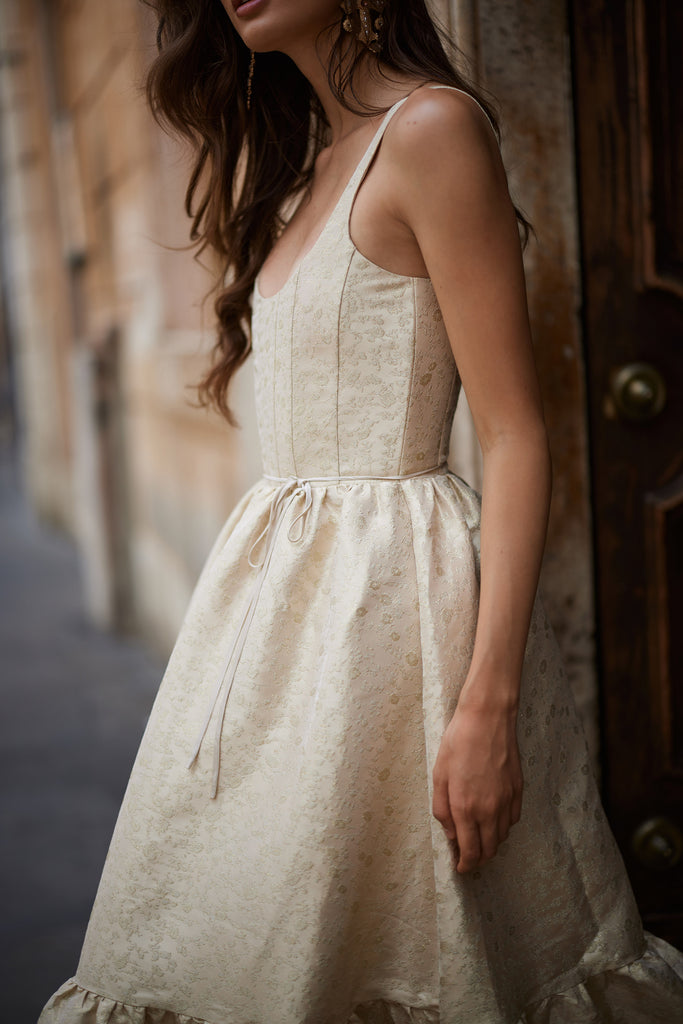 detail photo of model  in the avery dress in taupe duchess