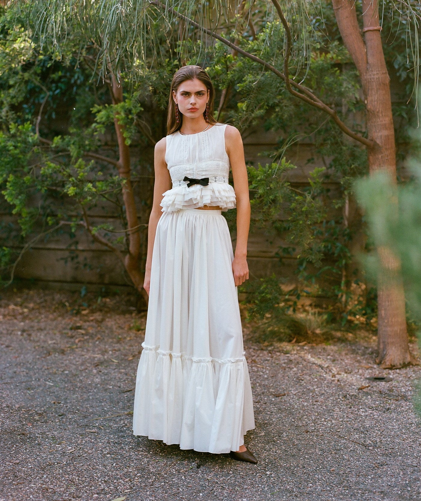 Long white dress photographed outdoors