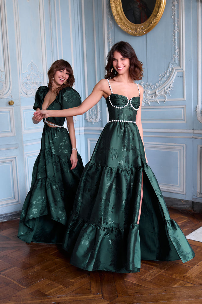 models dancing in the emma and lucetta dresses in emerald baroque floral