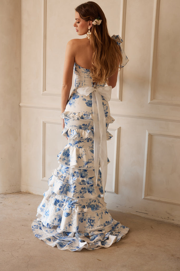 Full back view of model wearing The Barcelona set in Provencal Blue Floral. Model standing in front of white wall.