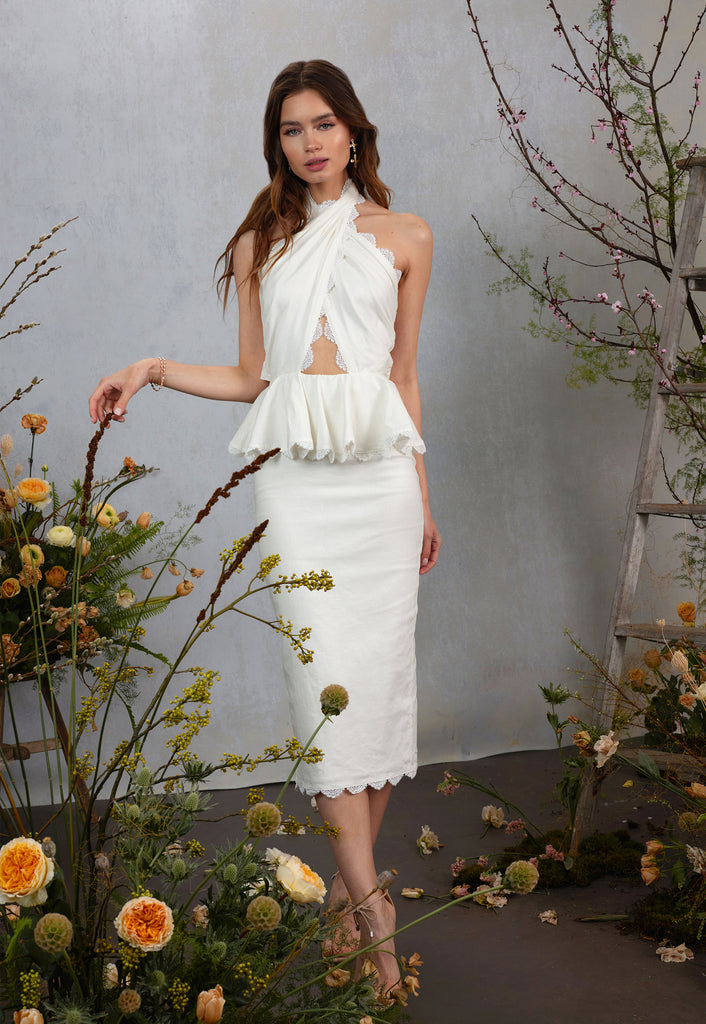 Full front view of model wearing The Daisy Dress in Natural.