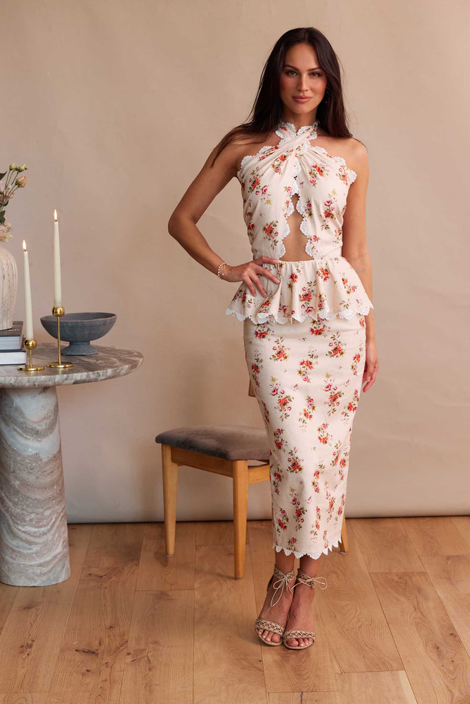 Full front view of model wearing The Daisy Dress in Natural Dainty Floral.