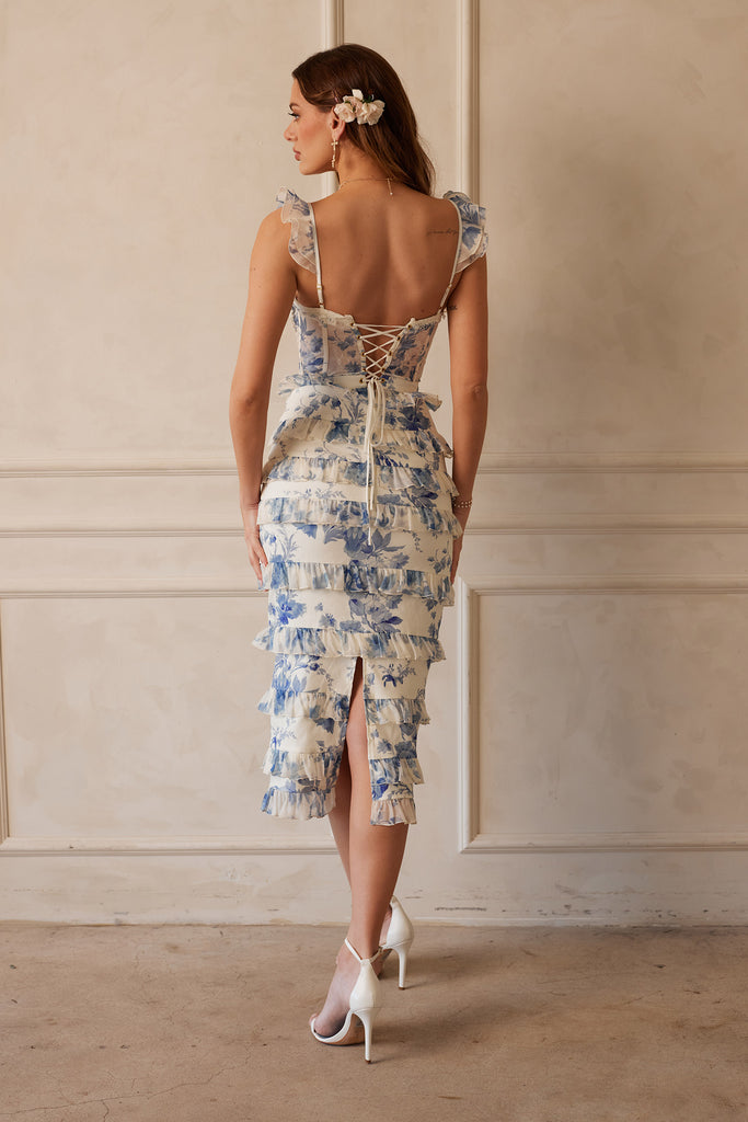 Full back view of model wearing The Fiorenza Dress in Provencal Blue Floral.