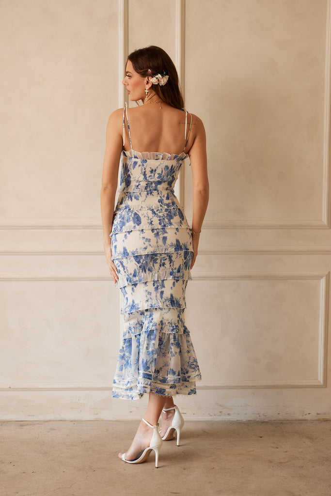 Full back view of model wearing The Geranium Dress in Provencal Blue Floral.